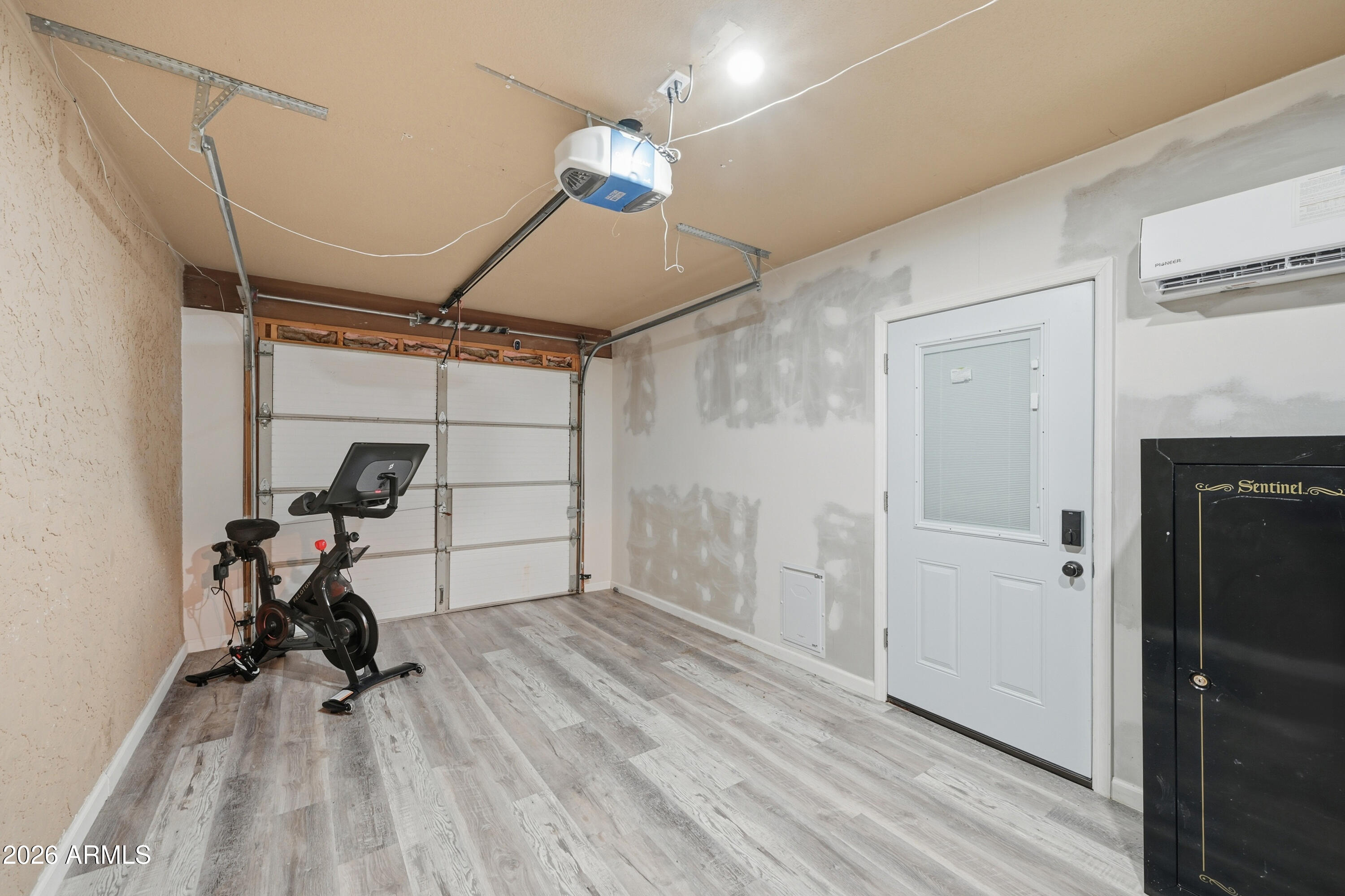 436 North Larkspur Street Gilbert, AZ 85234 - Photo 13 of 31 a view of a room with gym equipment and a window