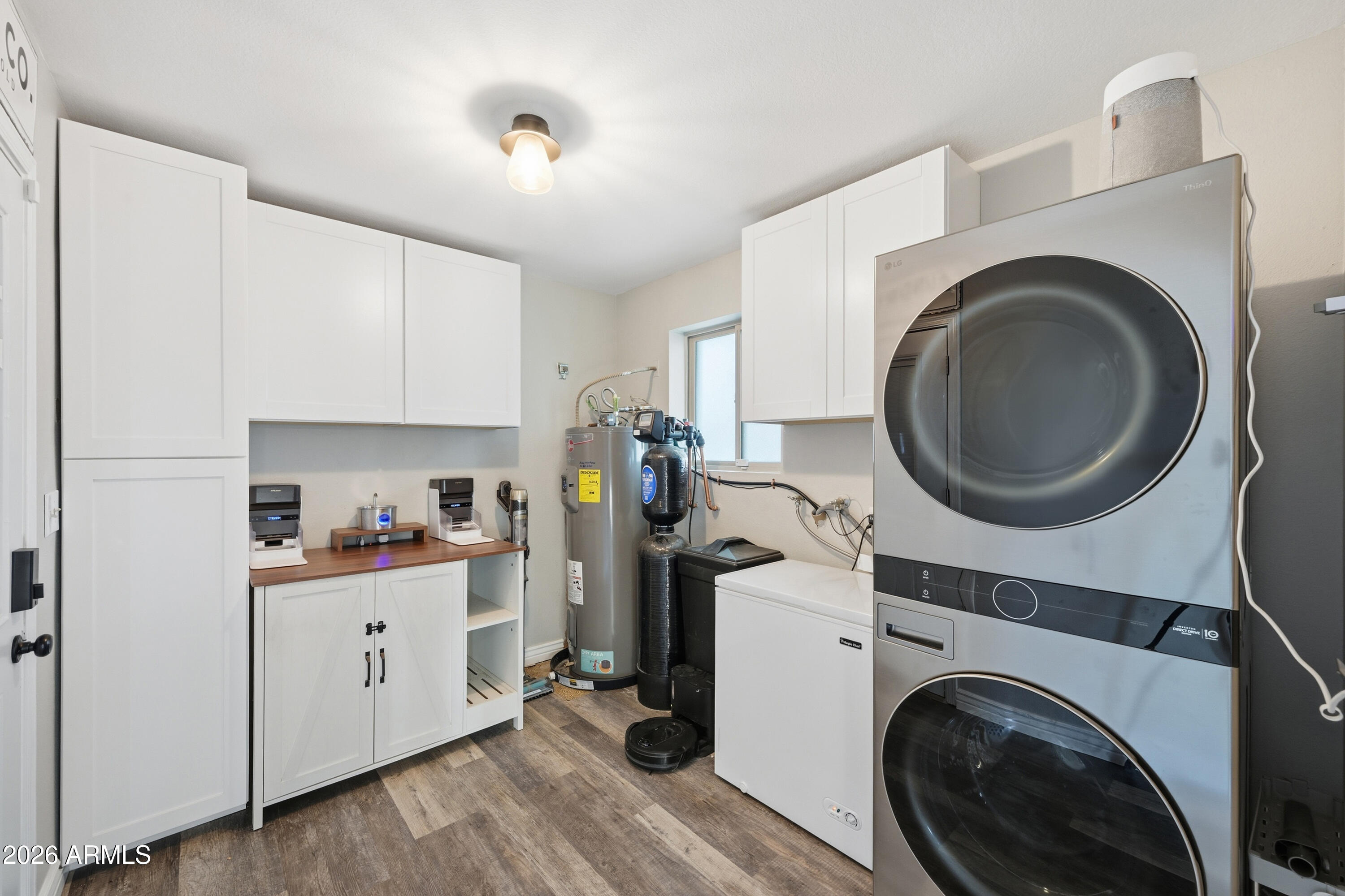 436 North Larkspur Street Gilbert, AZ 85234 - Photo 14 of 31 a view of a kitchen with a washer and dryer