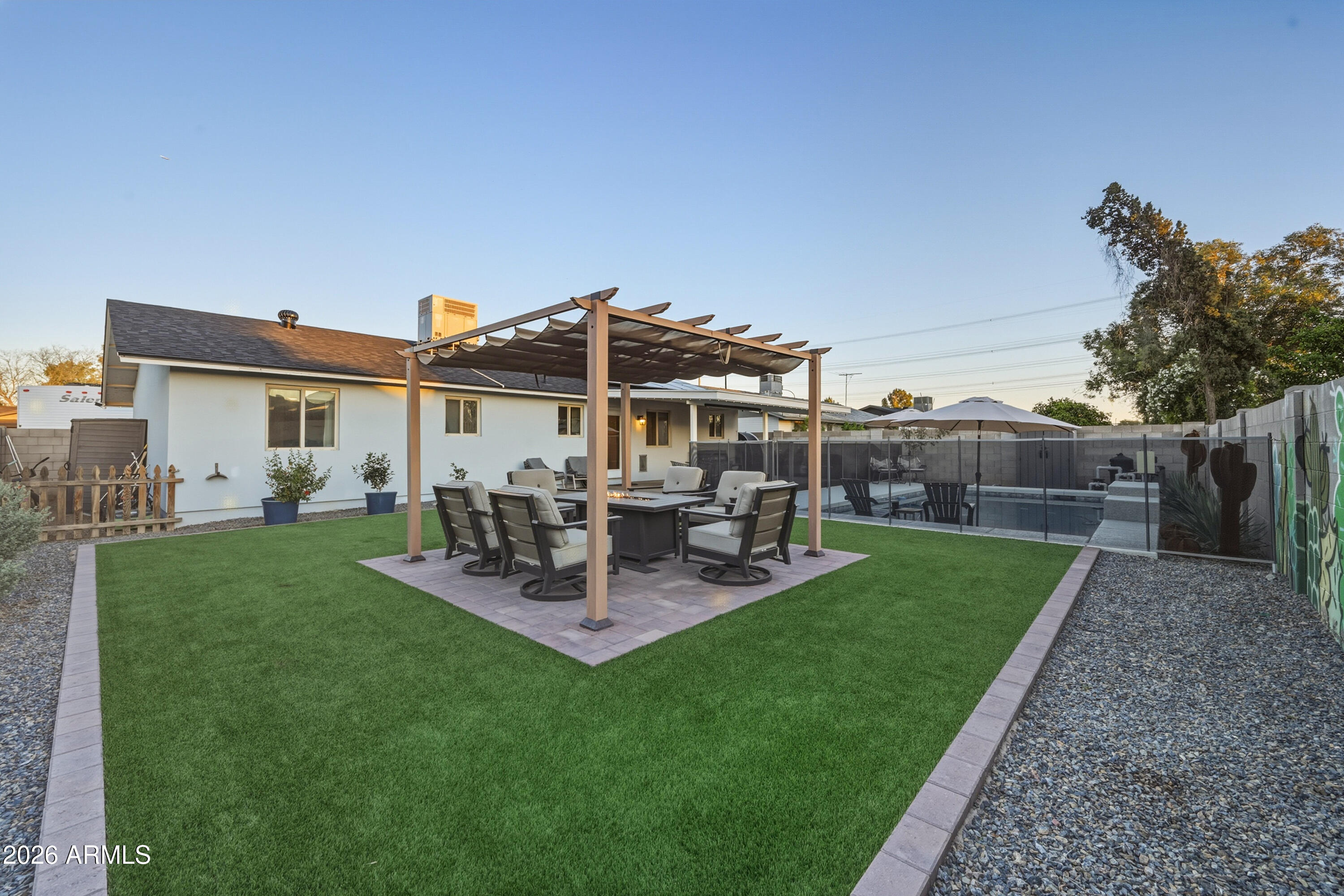 436 North Larkspur Street Gilbert, AZ 85234 - Photo 18 of 31 a view of a house with backyard porch and sitting area