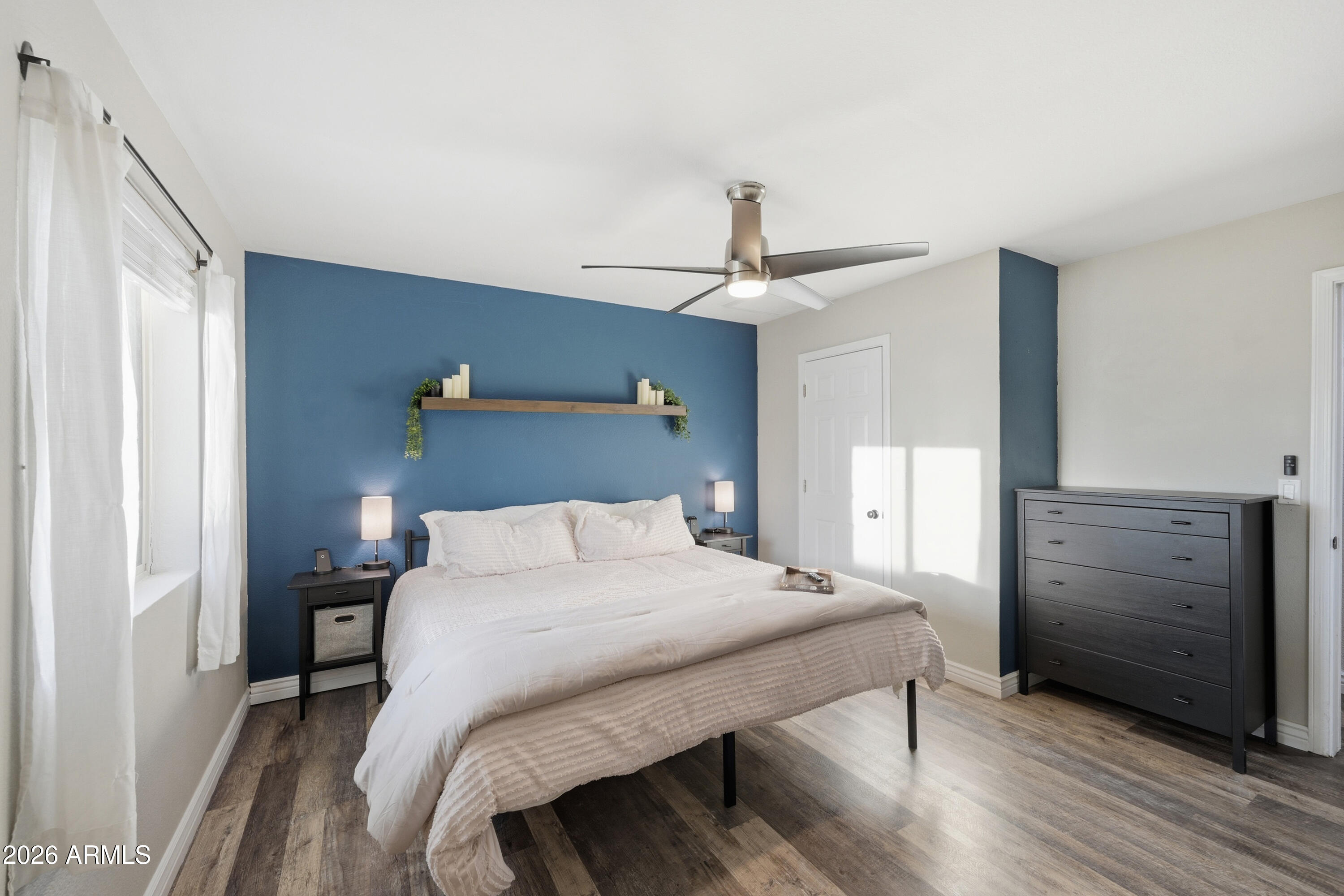 436 North Larkspur Street Gilbert, AZ 85234 - Photo 24 of 31 a bedroom with a bed and a dresser