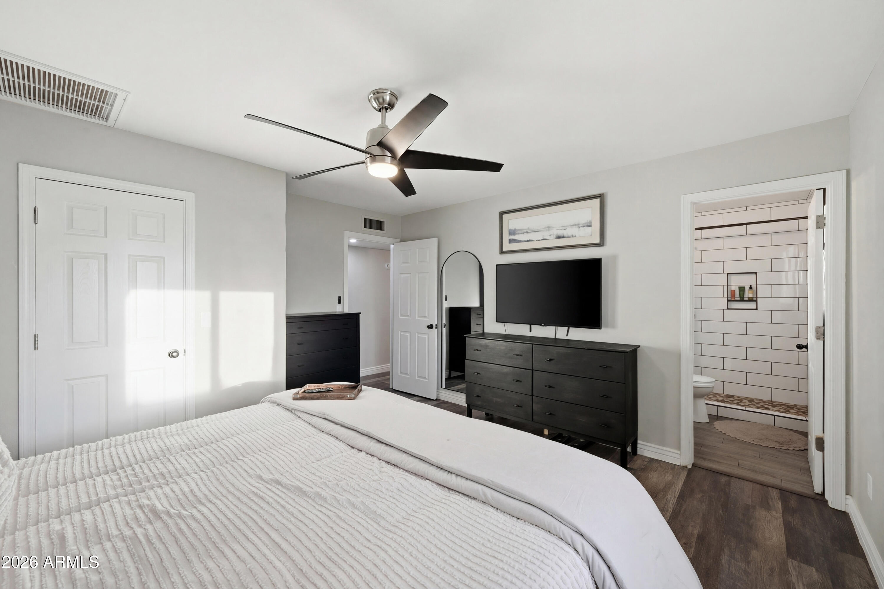 436 North Larkspur Street Gilbert, AZ 85234 - Photo 25 of 31 a bedroom with a bed and a flat screen tv