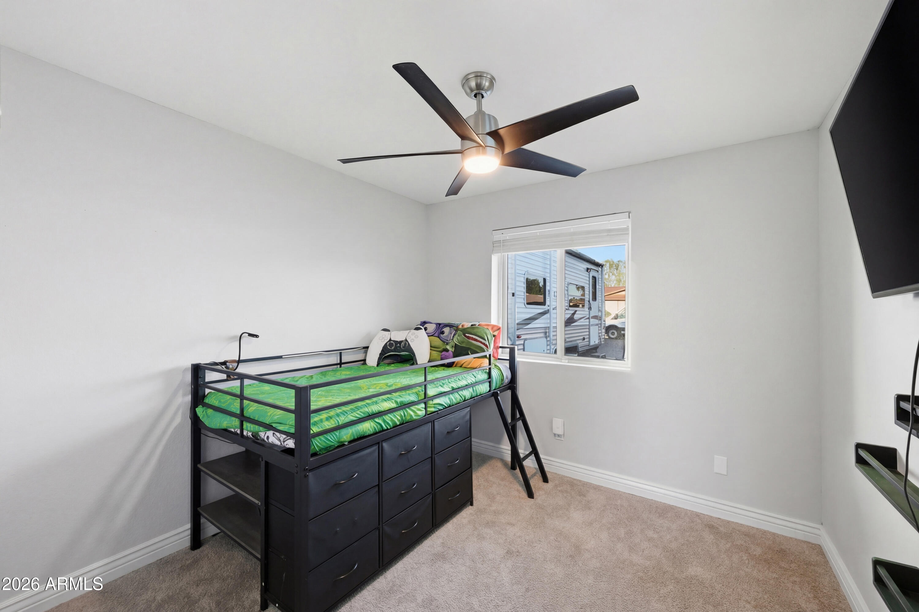 436 North Larkspur Street Gilbert, AZ 85234 - Photo 26 of 31 a room with furniture and a window