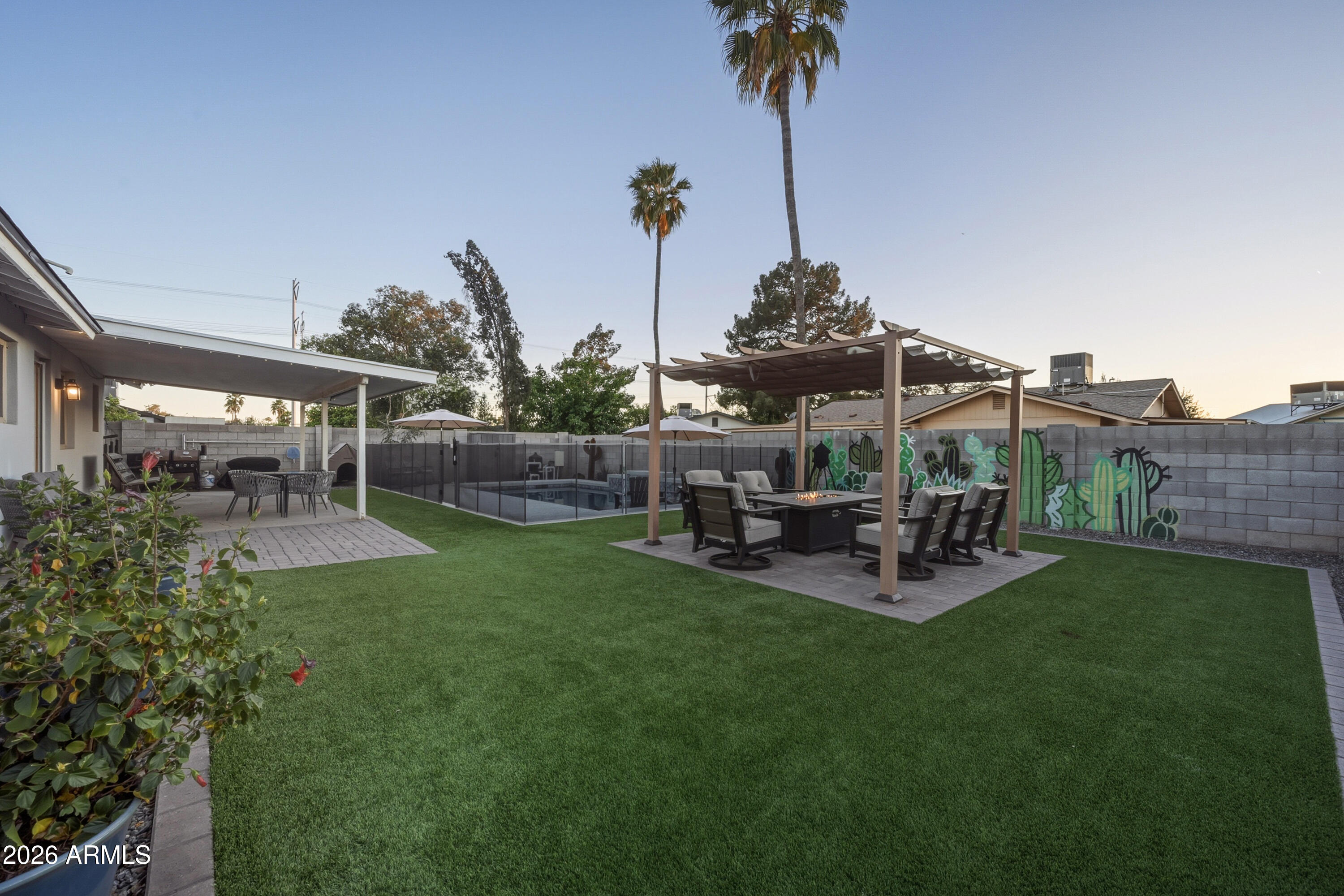 436 North Larkspur Street Gilbert, AZ 85234 - Photo 3 of 31 a view of a backyard with sitting area