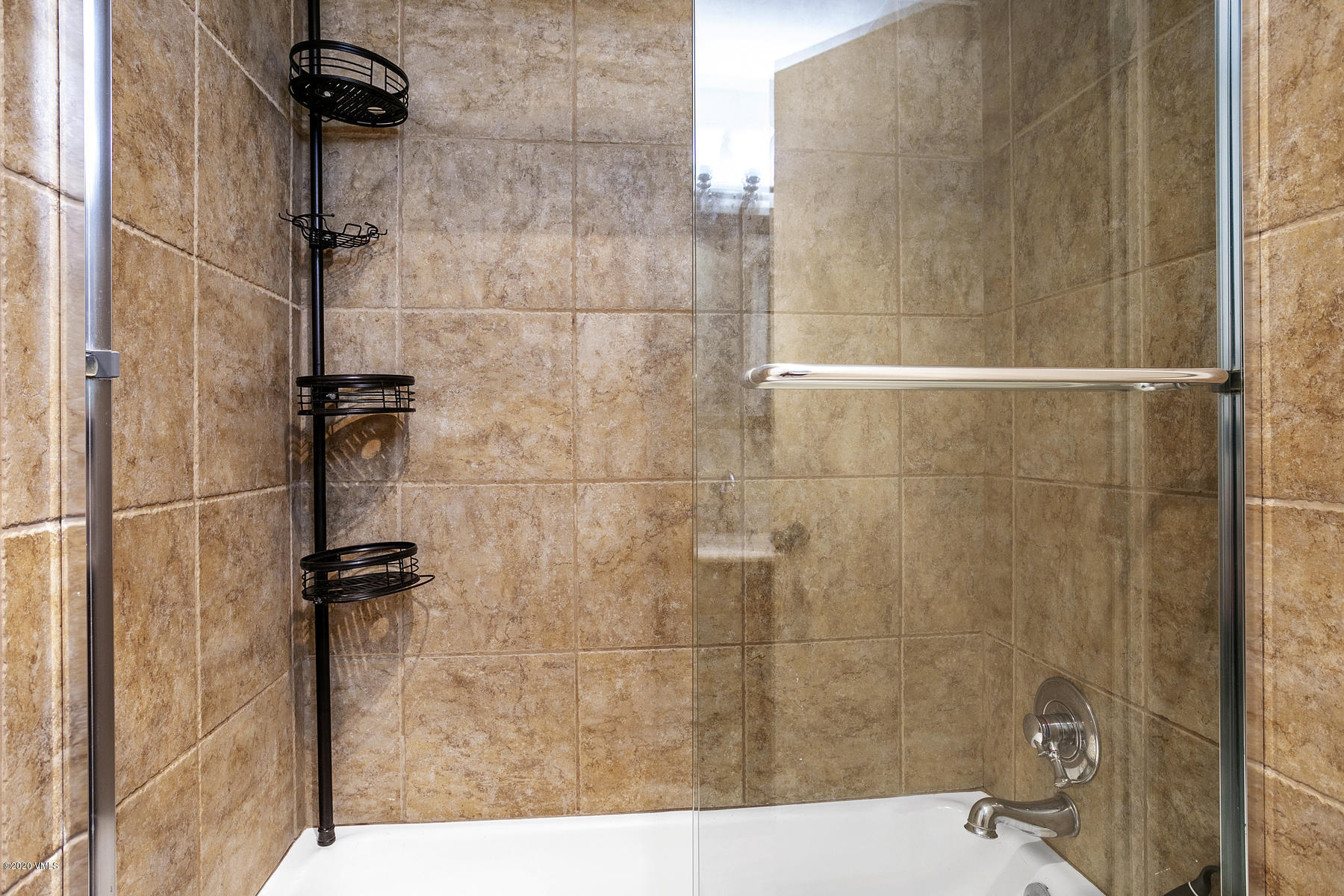 124 Eagle Road, Unit C Avon, CO 81620 - Photo 16 of 35 a bathroom with a shower