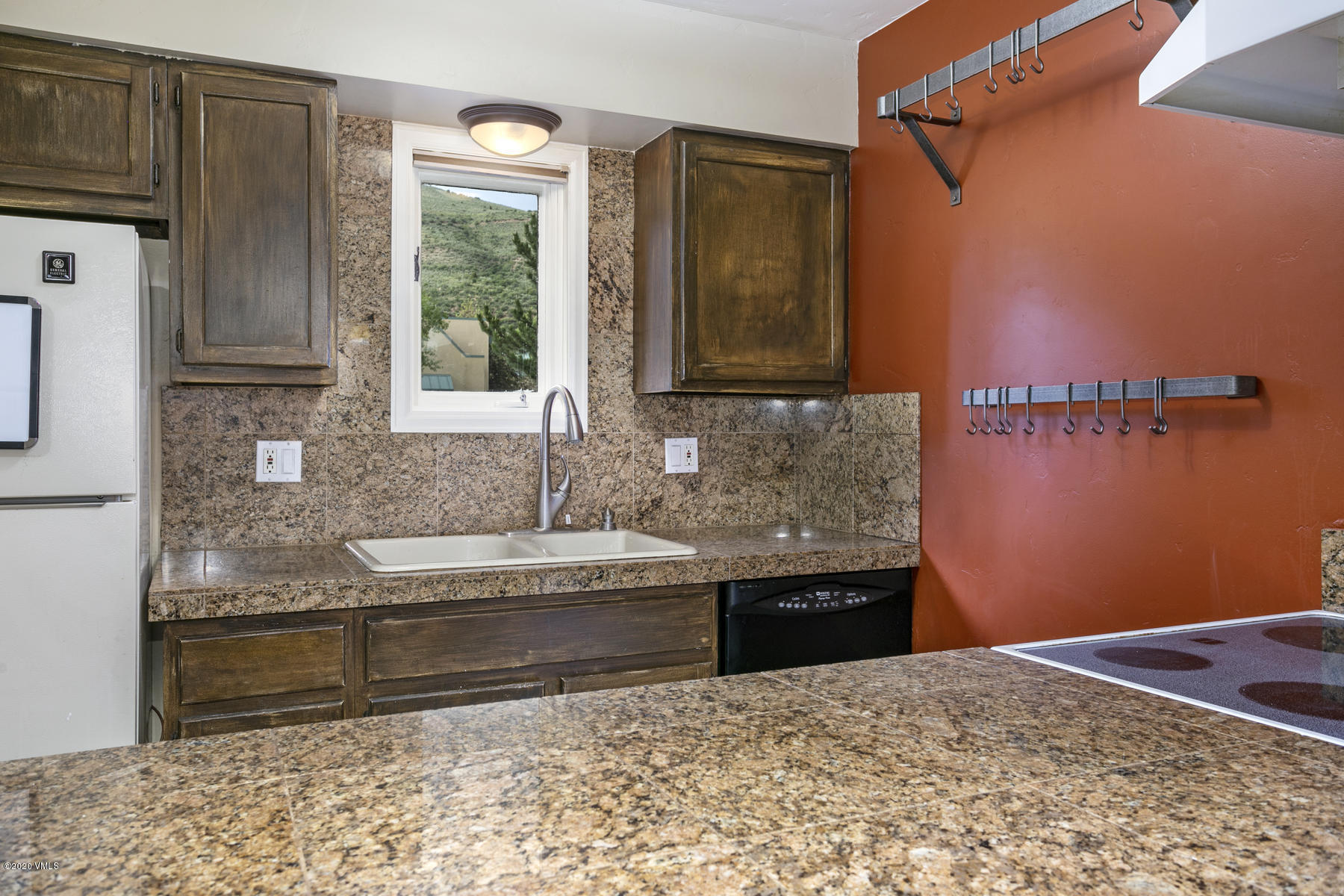 124 Eagle Road, Unit C Avon, CO 81620 - Photo 6 of 35 a bathroom with a sink and a mirror