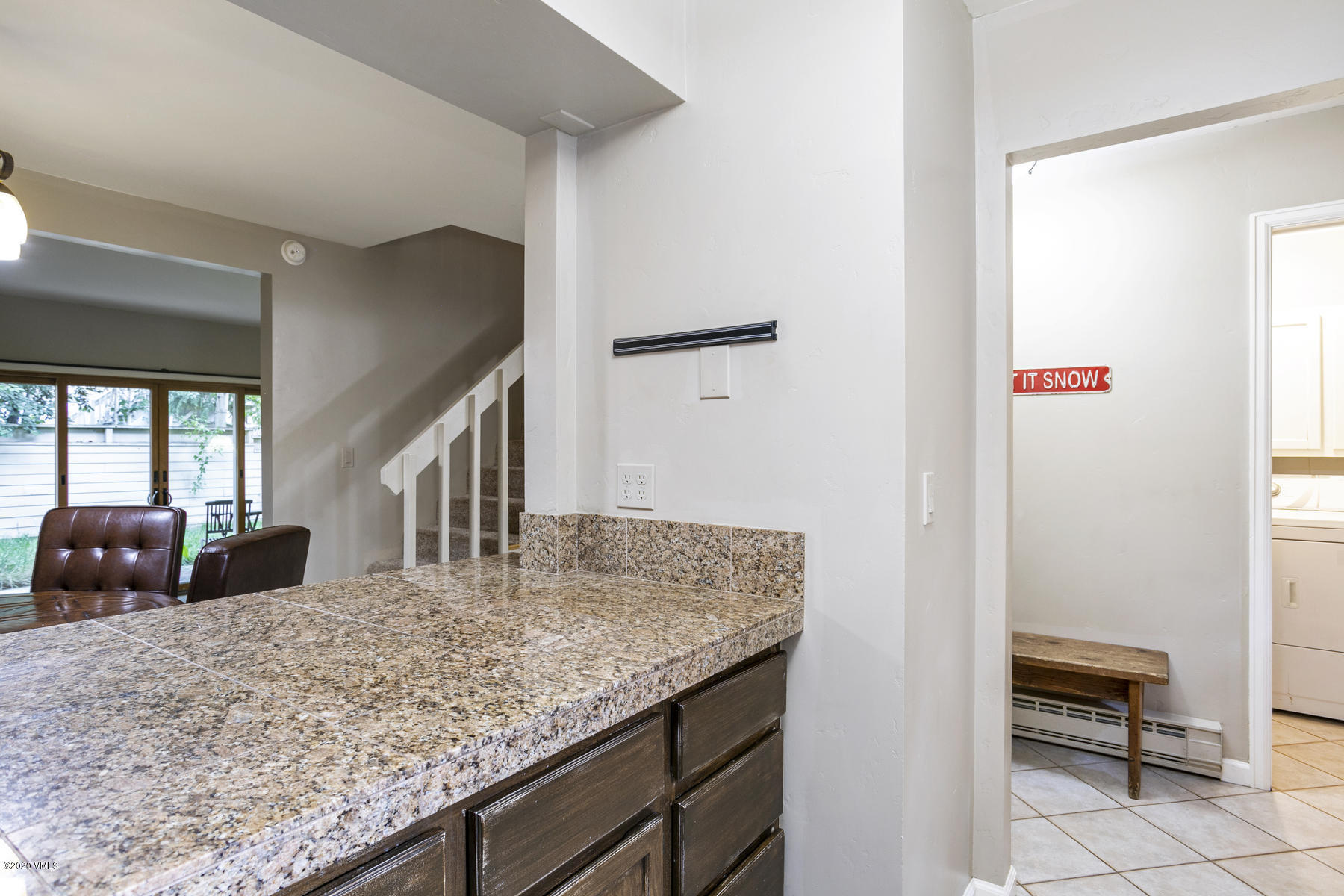 124 Eagle Road, Unit C Avon, CO 81620 - Photo 7 of 35 a view of kitchen and living room