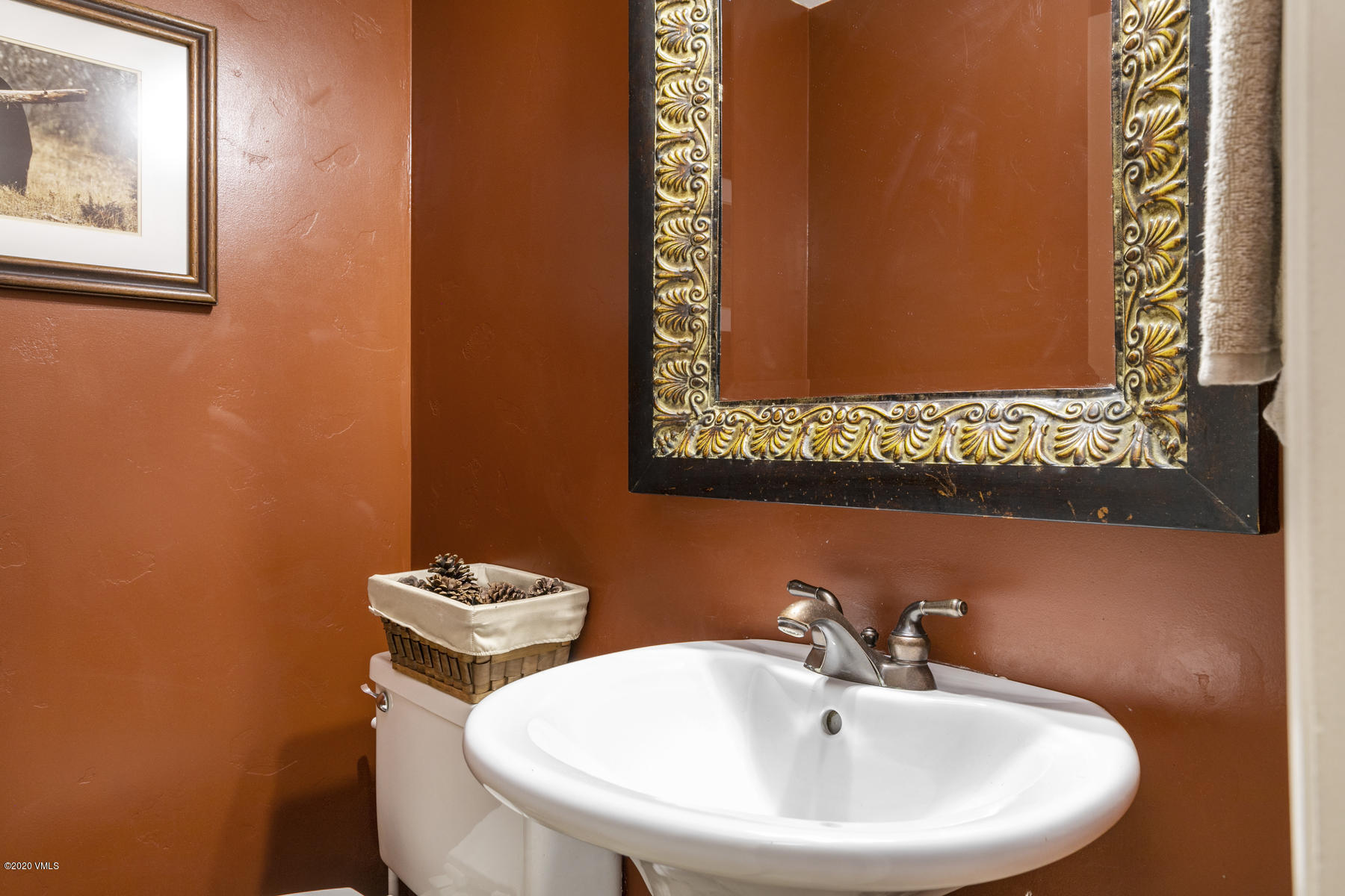 124 Eagle Road, Unit C Avon, CO 81620 - Photo 10 of 35 a bathroom with a sink and a mirror