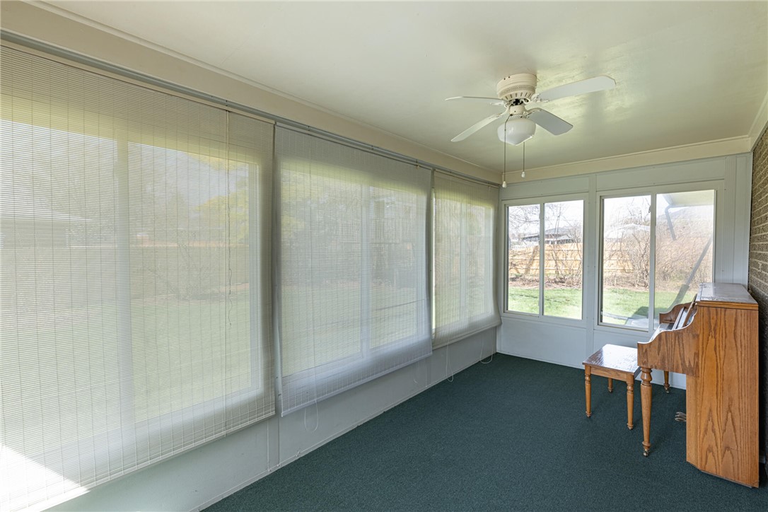 5235 West Ridgewood Road Springfield, OH 45503 - Photo 27 of 32 This bright sunroom provides a versatile space, perfect for relaxation or a creative pursuit.