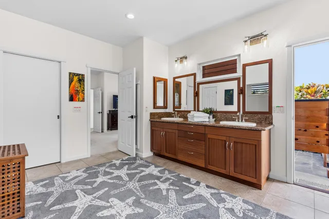 a bathroom with a tub and a sink
