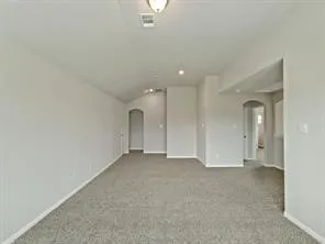 an empty room with a bathroom