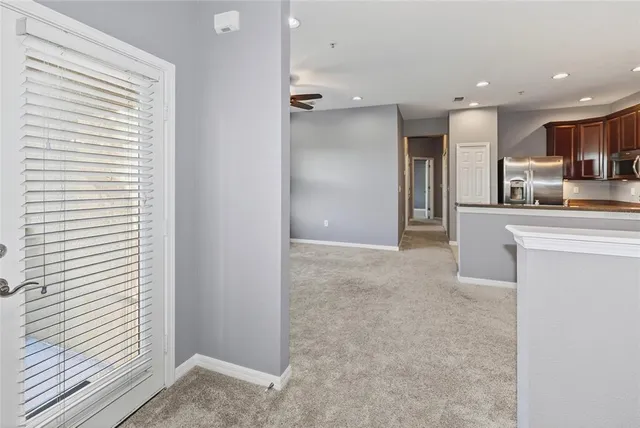 a view of a kitchen with a sink