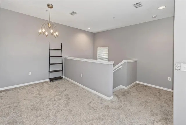 a view of a chandelier fan