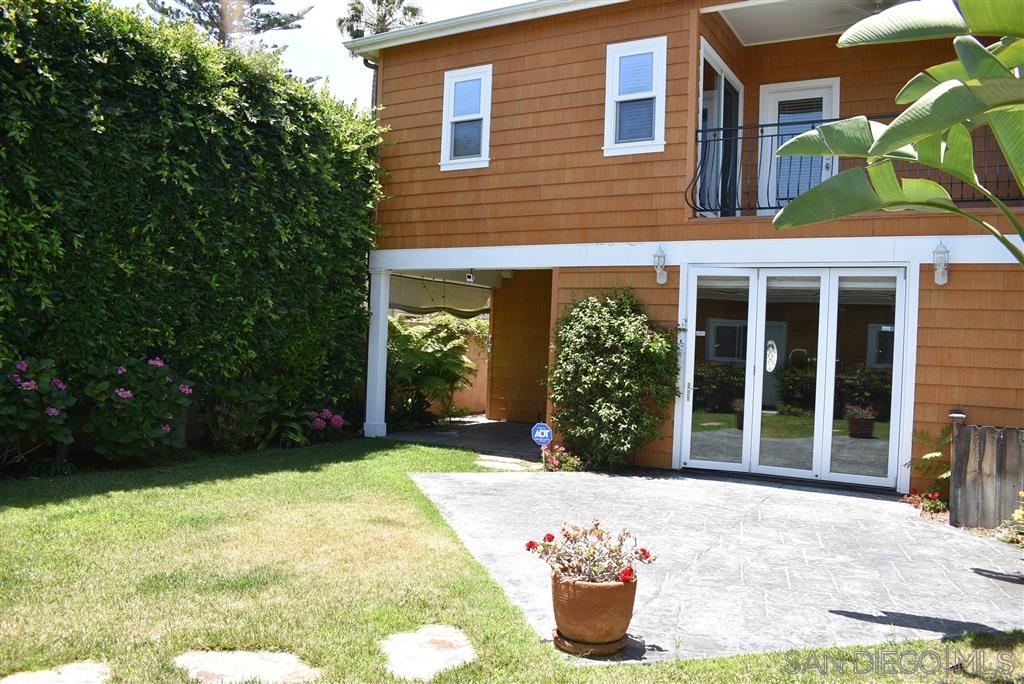 425 Alameda Boulevard Coronado, CA 92118 - Photo 6 of 9 a front view of a house with a yard