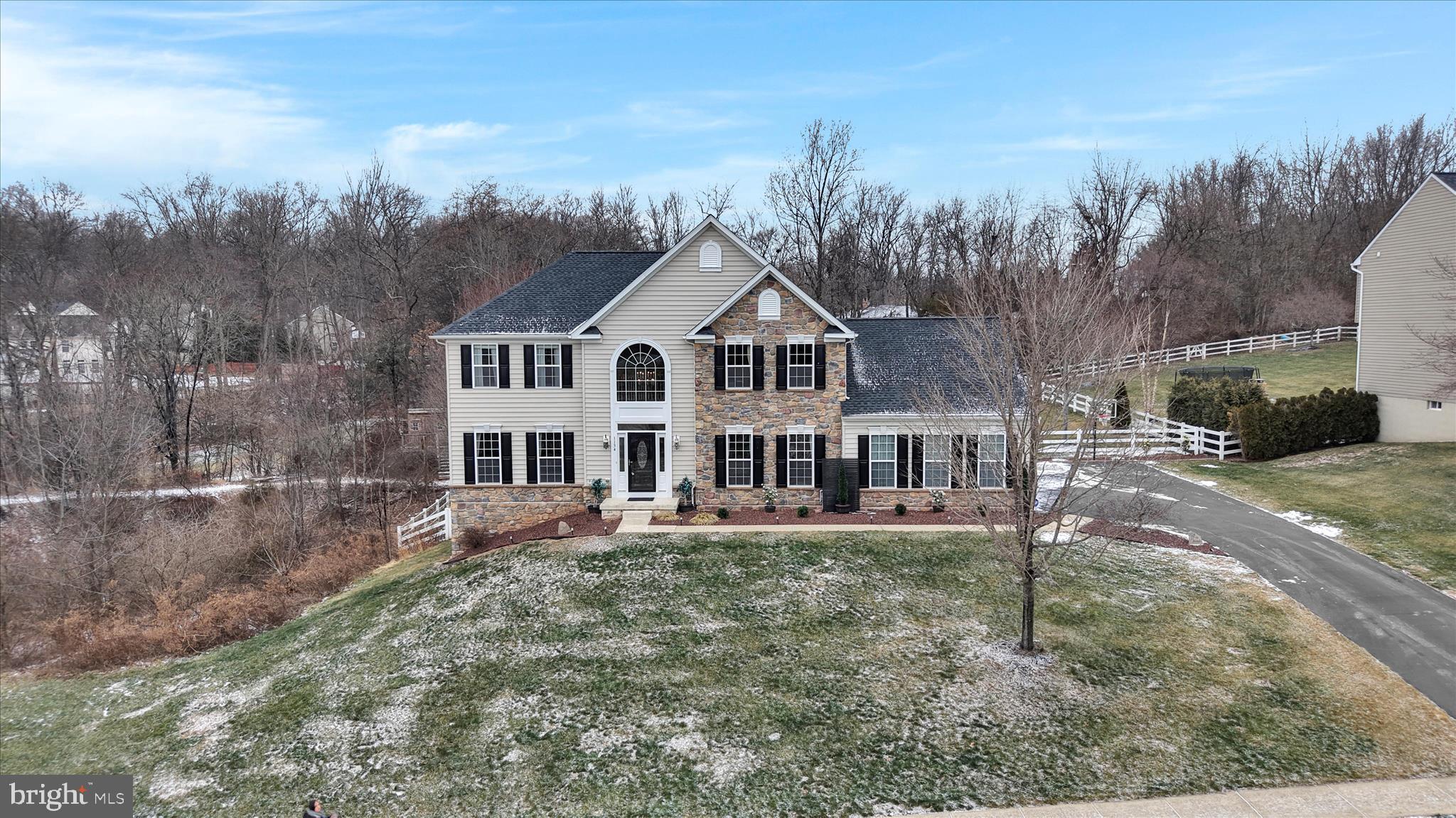 1134 South Sanatoga Road Pottstown, PA 19465 - Photo 1 of 1 a front view of a house with a garden and trees