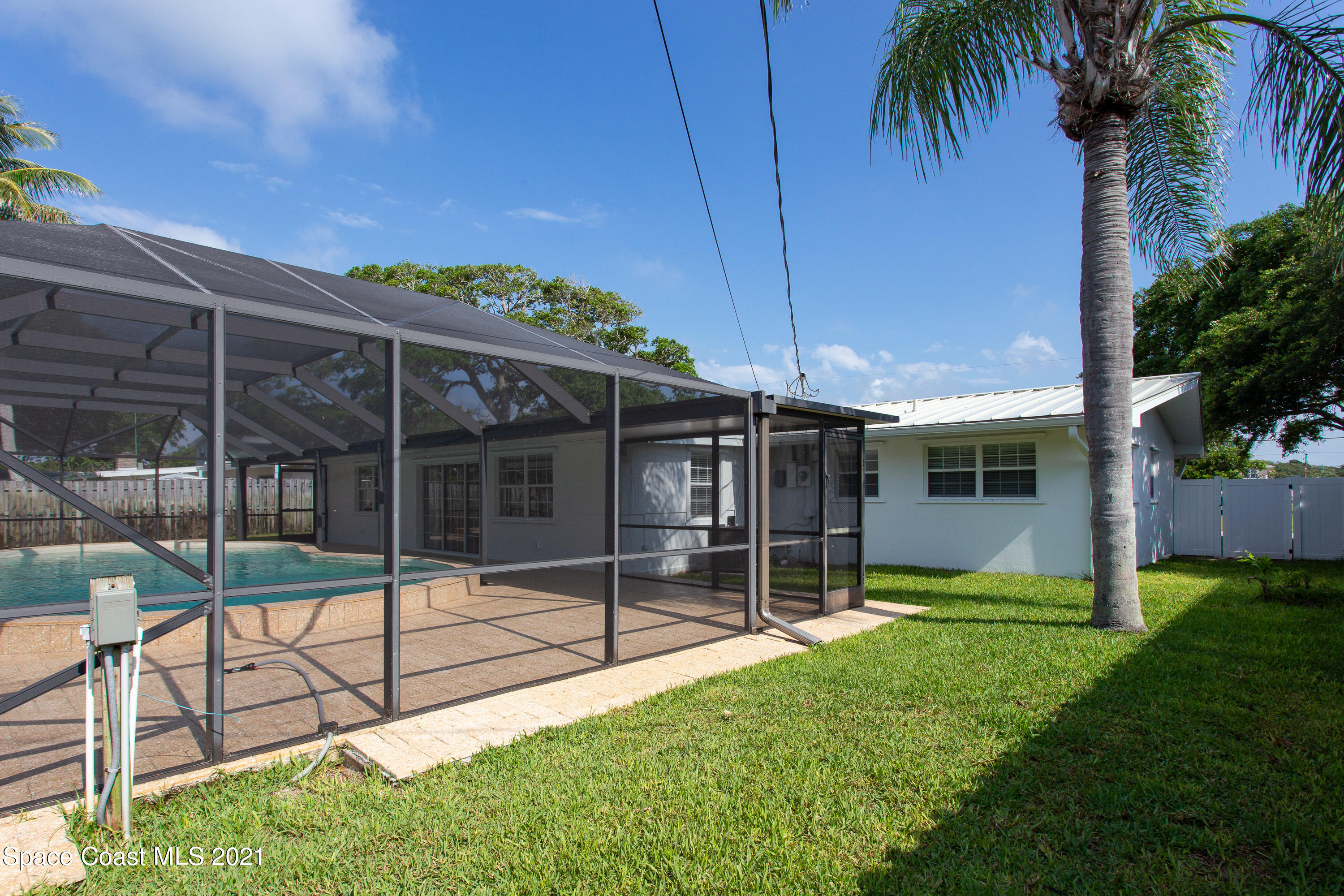 370 Capri Road Cocoa Beach, FL 32931 - Photo 21 of 21 a view of a backyard
