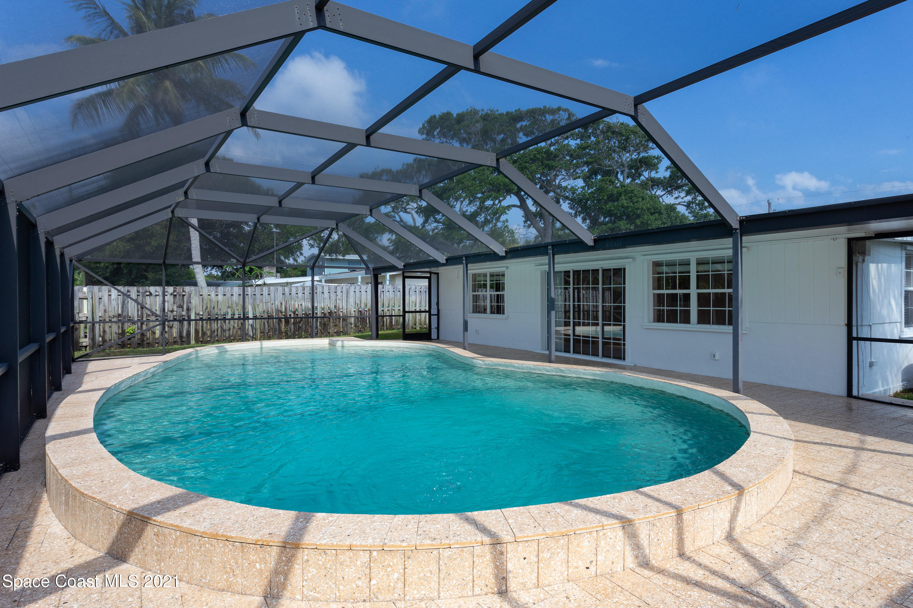 370 Capri Road Cocoa Beach, FL 32931 - Photo 4 of 21 a view of a backyard