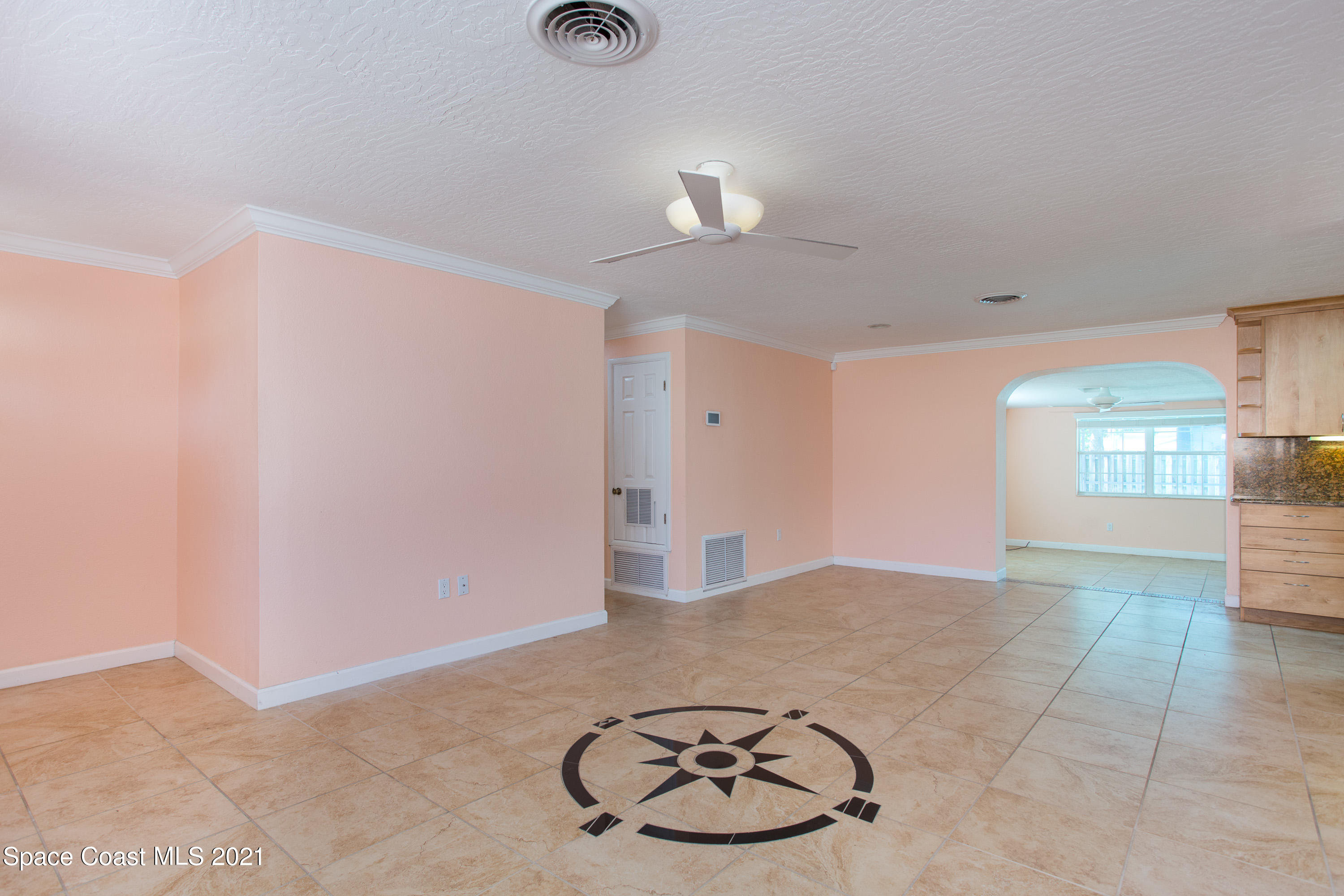 370 Capri Road Cocoa Beach, FL 32931 - Photo 7 of 21 a view of a room with a gym equipment