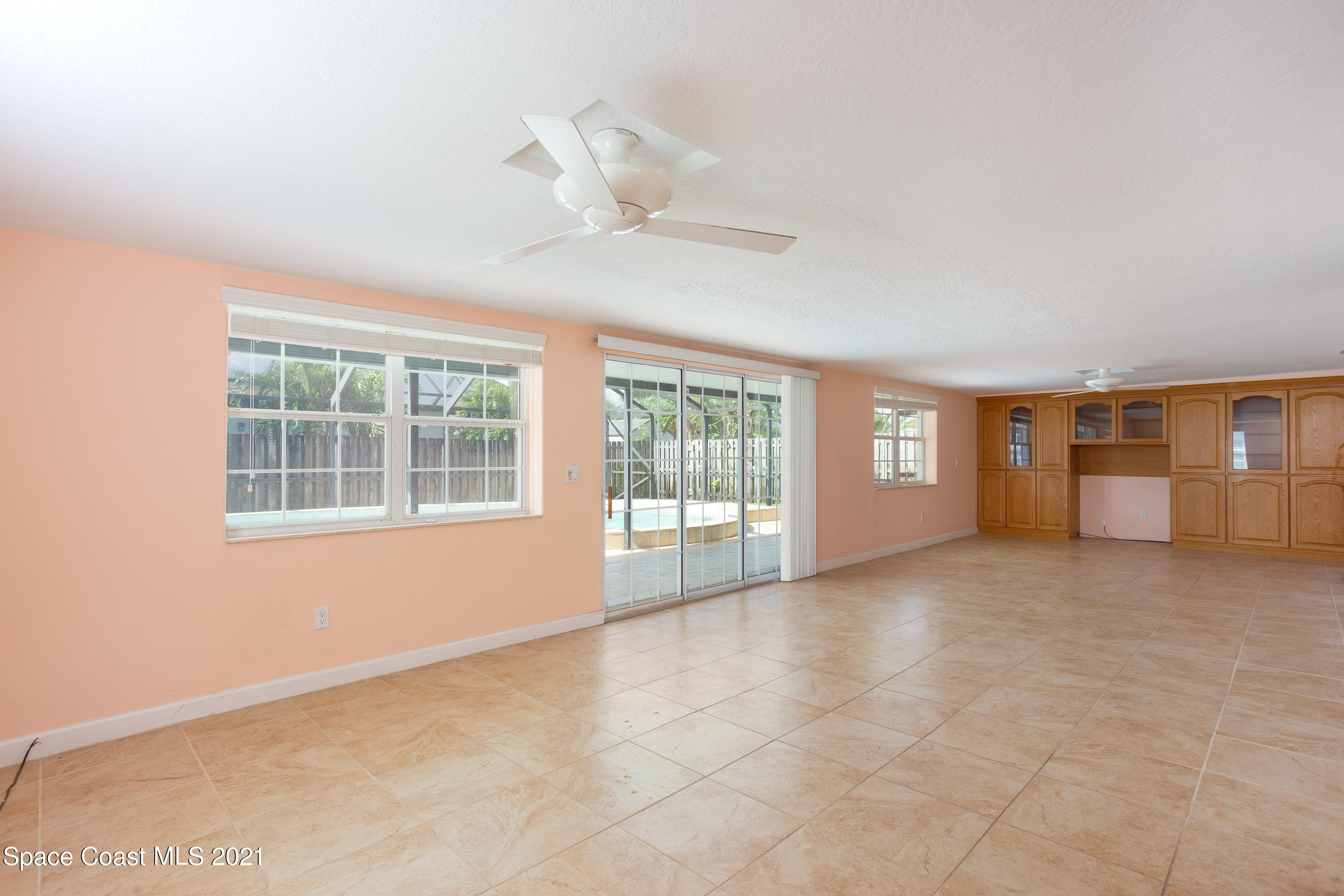 370 Capri Road Cocoa Beach, FL 32931 - Photo 10 of 21 a view of an empty room with a window