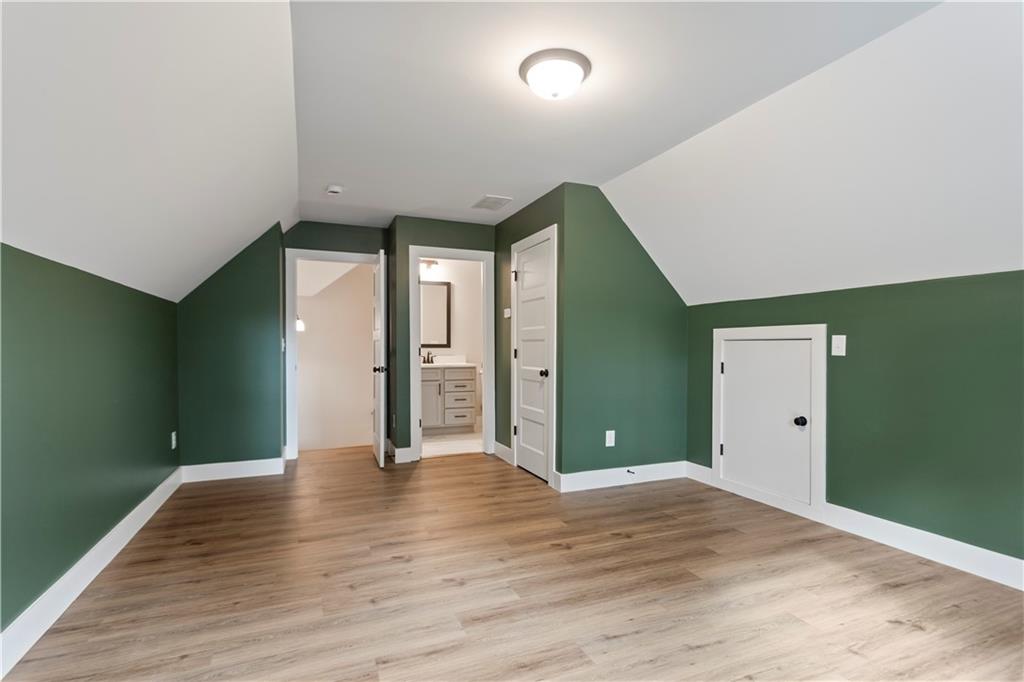 150 Old Sandhill Road Carrollton, GA 30116 - Photo 29 of 36 a view of a hallway with wooden floor