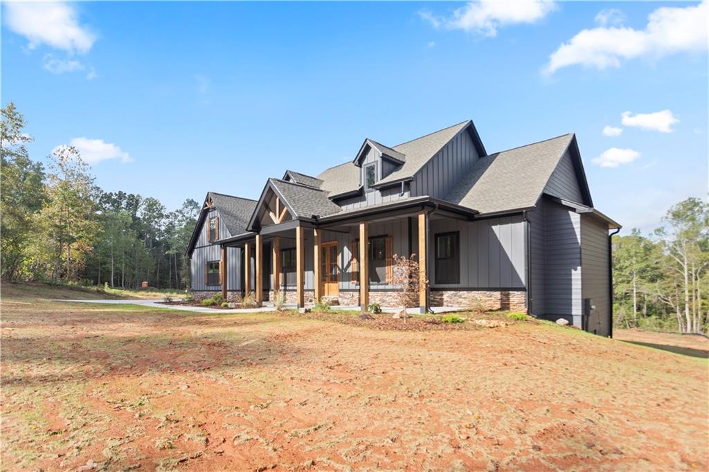 150 Old Sandhill Road Carrollton, GA 30116 - Photo 36 of 36 a view of the house with a outdoor space