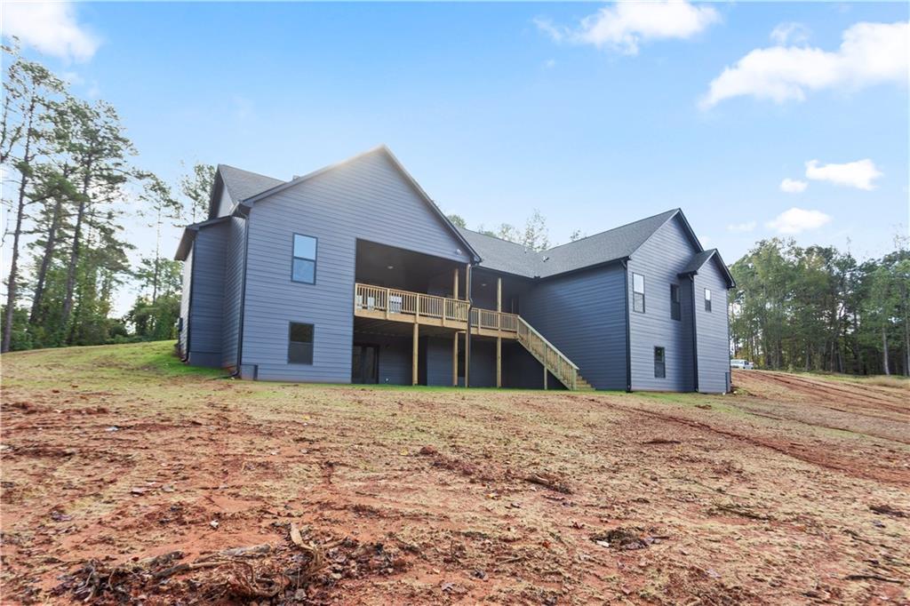 150 Old Sandhill Road Carrollton, GA 30116 - Photo 4 of 36 a house with a outdoor space