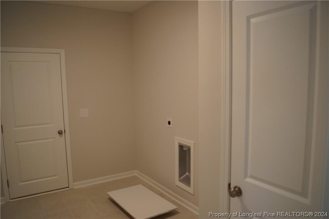 111 Knotts Berry Road Bunnlevel, NC 28323 - Photo 26 of 32 a bathroom with a window