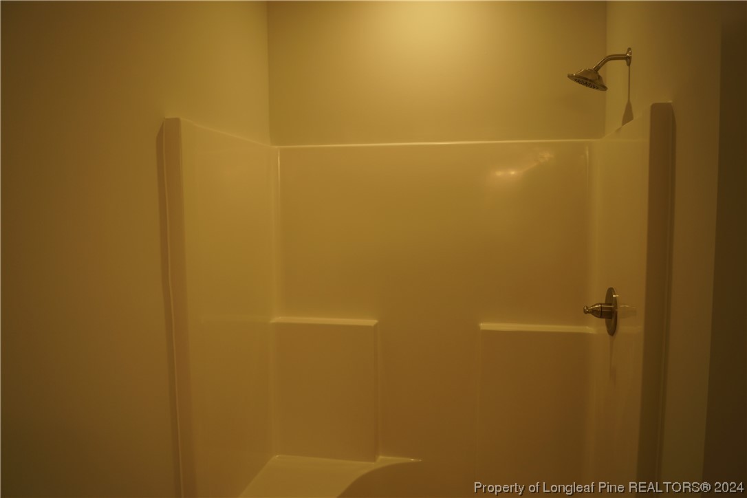 111 Knotts Berry Road Bunnlevel, NC 28323 - Photo 30 of 32 a bathroom with a shower