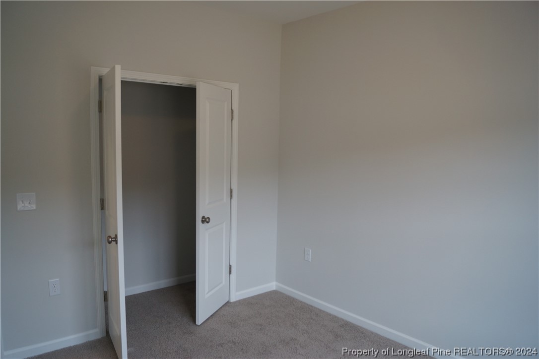 111 Knotts Berry Road Bunnlevel, NC 28323 - Photo 6 of 32 a view of an empty room