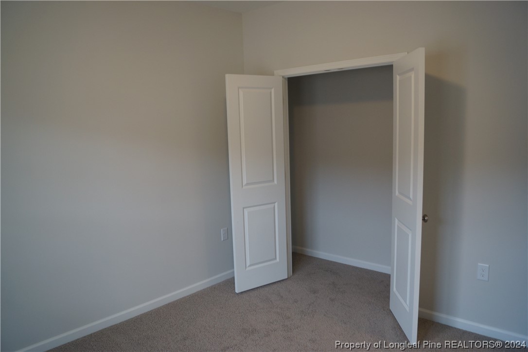 111 Knotts Berry Road Bunnlevel, NC 28323 - Photo 10 of 32 a view of an empty room