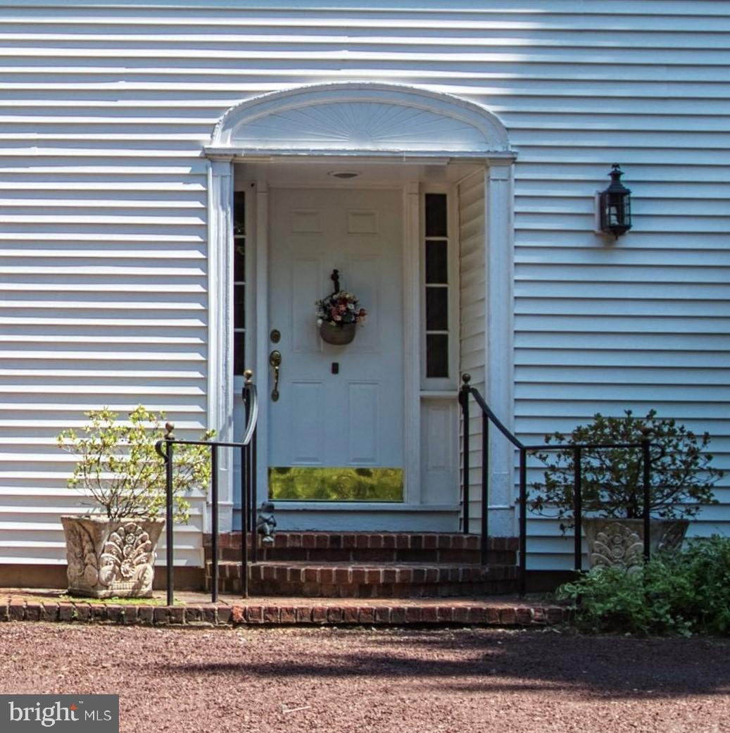 4 Sunset Road Lawrenceville, NJ 08648 - Photo 8 of 43 Covered front door w/ brick steps