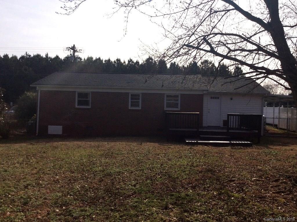 1305 Miles Road Dallas, NC 28034 - Photo 2 of 12 a house view with a backyard space