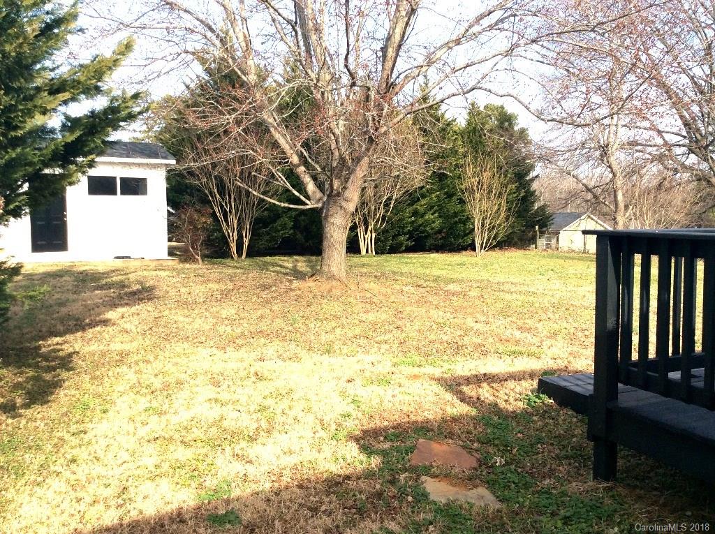 1305 Miles Road Dallas, NC 28034 - Photo 3 of 12 a view of back yard of the house