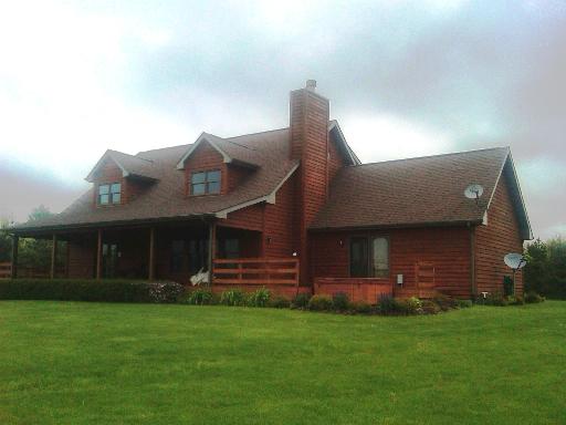 41-w665 Lenz Road Elgin, IL 60124 - Photo 1 of 1 a front view of a house with a garden