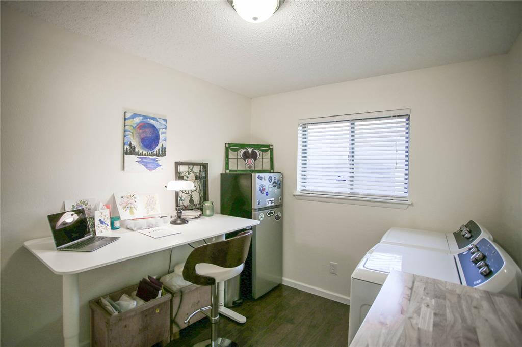 1720 Crystal Way Plano, TX 75074 - Photo 24 of 32 a view of a workspace with furniture and a window