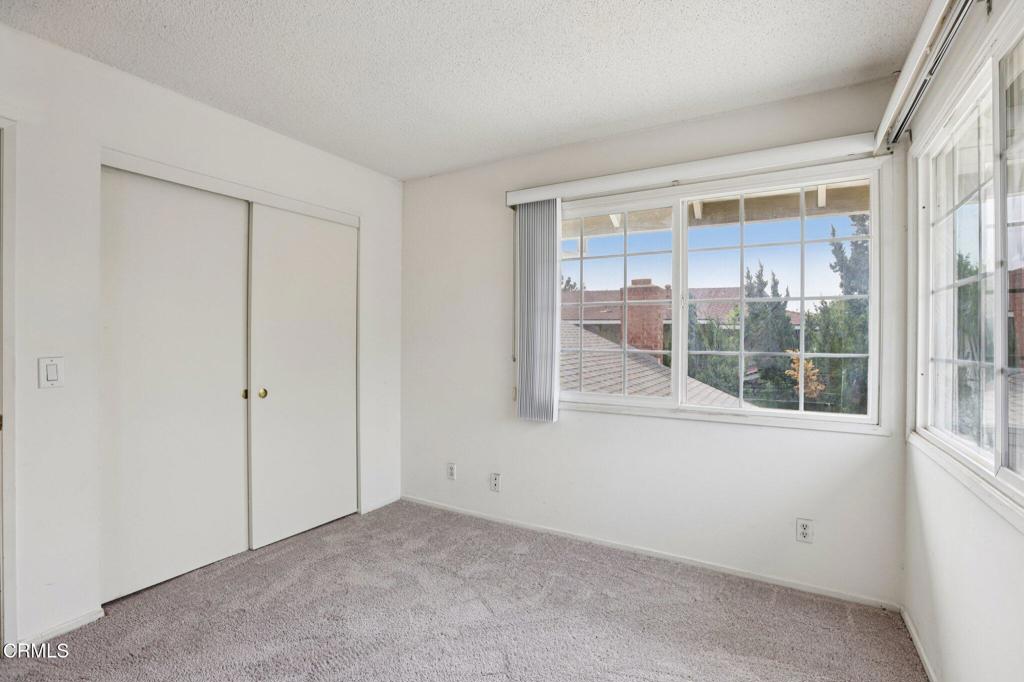 10856 Topeka Drive Porter Ranch, CA 91326 - Photo 29 of 40 an empty room with a window