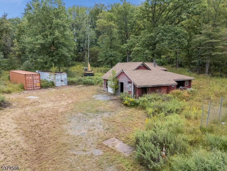 601 Fox Farm Road Asbury, NJ 08802 - Photo 5 of 15 an aerial view of a house with yard and trees in the background