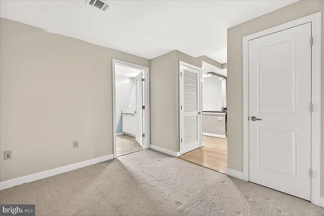 an empty room with a door