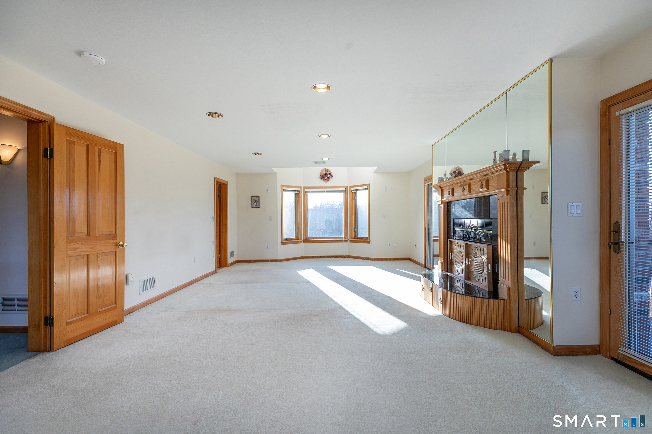233 Southbury Road Roxbury, CT 06783 - Photo 19 of 38 a view of a hallway with windows and closet