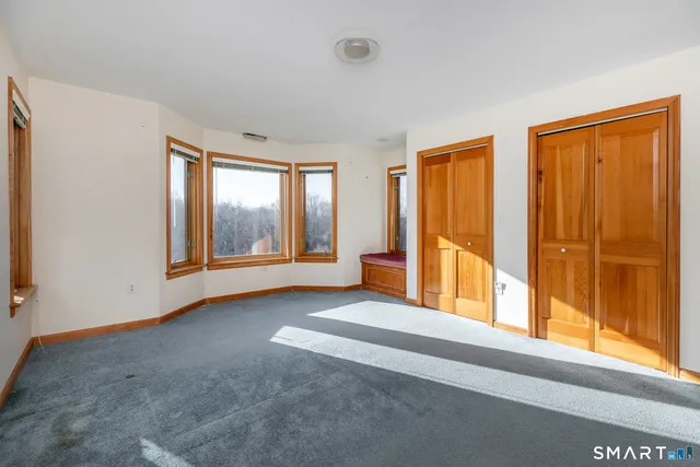 an empty room with windows