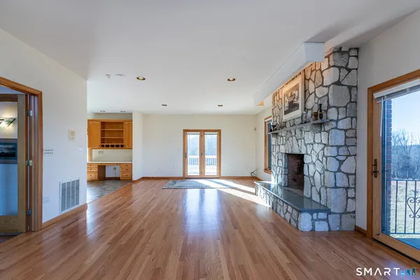 a view of an empty room with a window