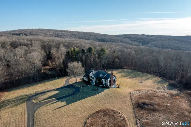 a view of a backyard with mountain view and mountain view