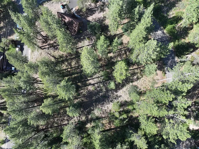 a view of a lake with a house