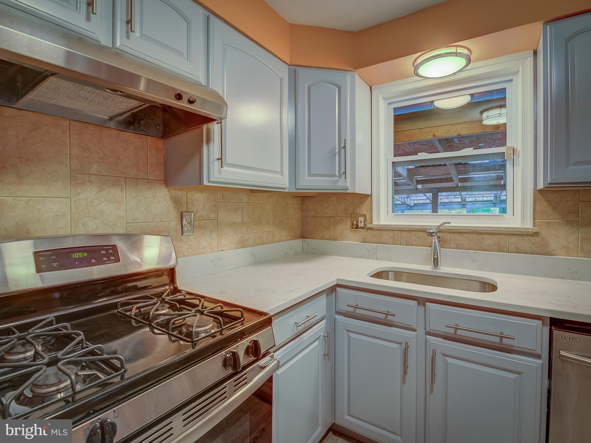 2004 Arcola Avenue Silver Spring, MD 20902 - Photo 13 of 43 Newly renovated kitchen with beautiful tilework