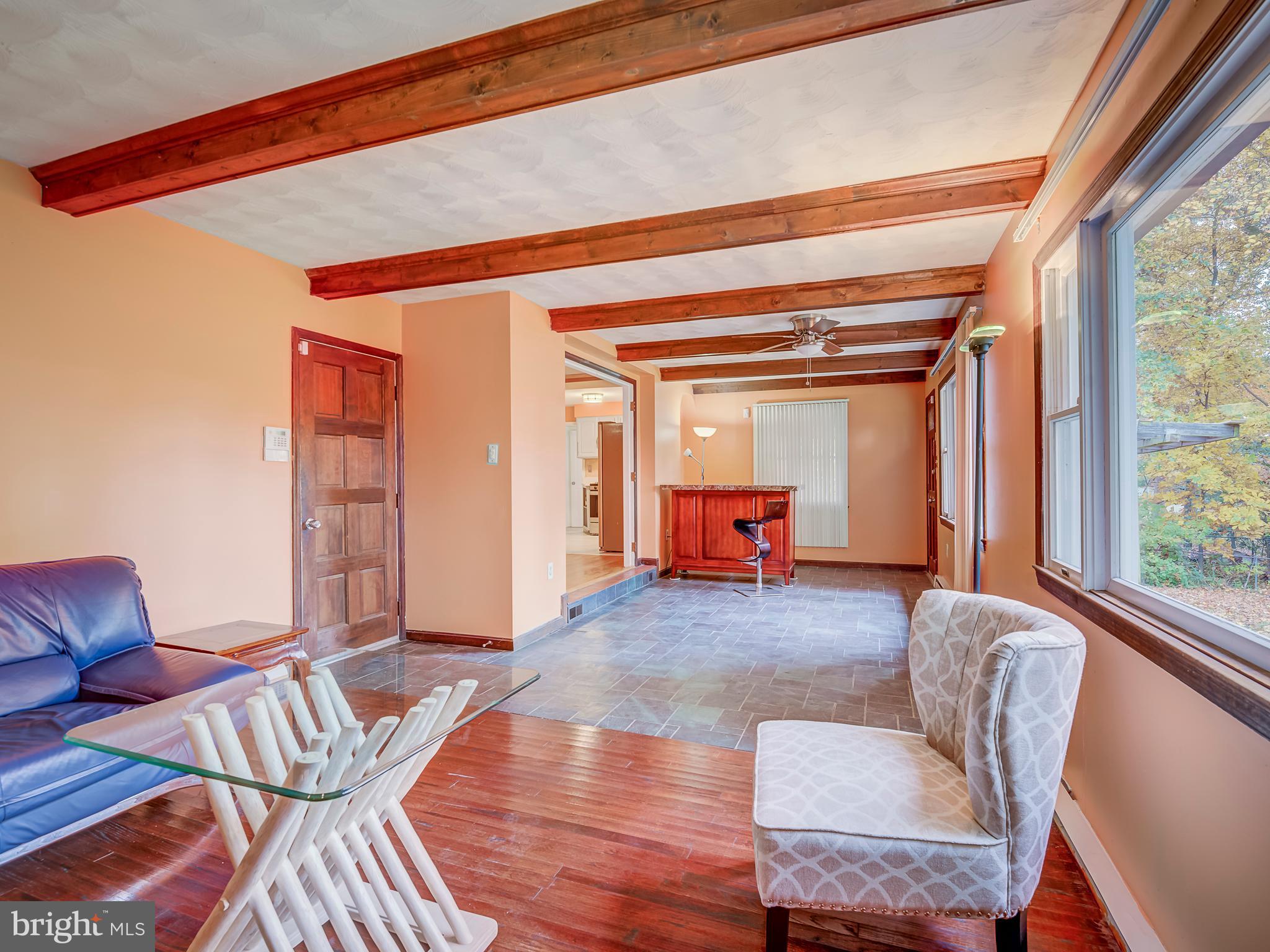 2004 Arcola Avenue Silver Spring, MD 20902 - Photo 10 of 43 Beautiful exposed beams with natural light