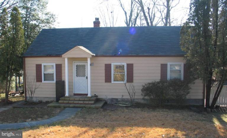 11906 Colin Road Silver Spring, MD 20906 - Photo 1 of 1 a front view of a house with garden