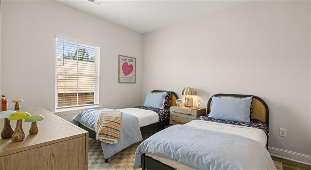 100 Rosemoore Drive Covington, GA 30014 - Photo 20 of 41 a bedroom with two beds and a window