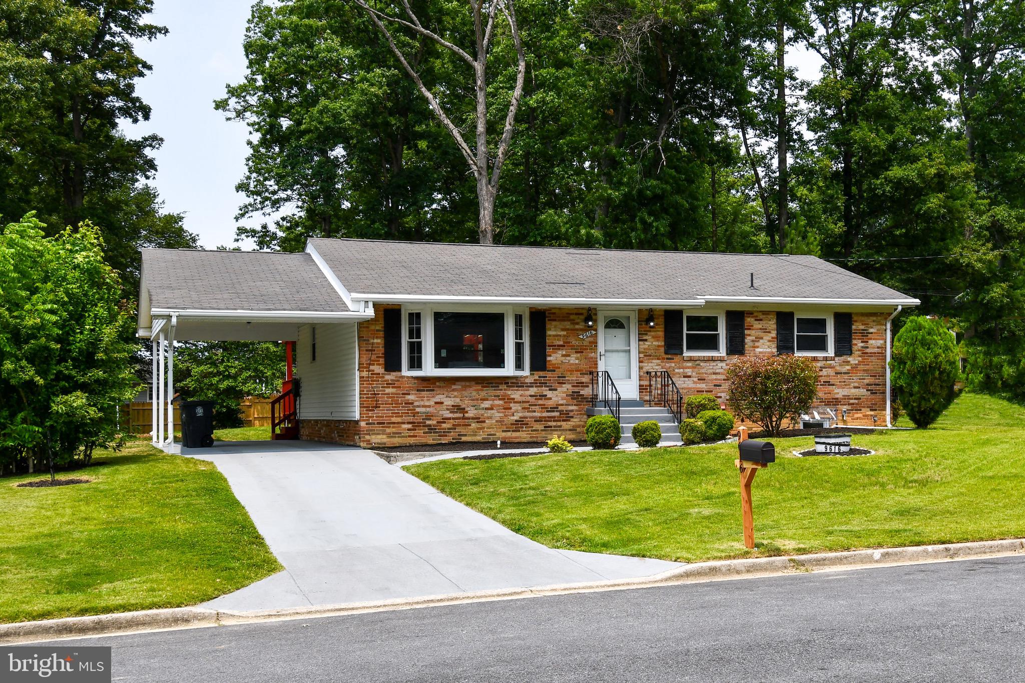 9616 Small Drive Clinton, MD 20735 - Photo 2 of 50 front view of a house with a yard