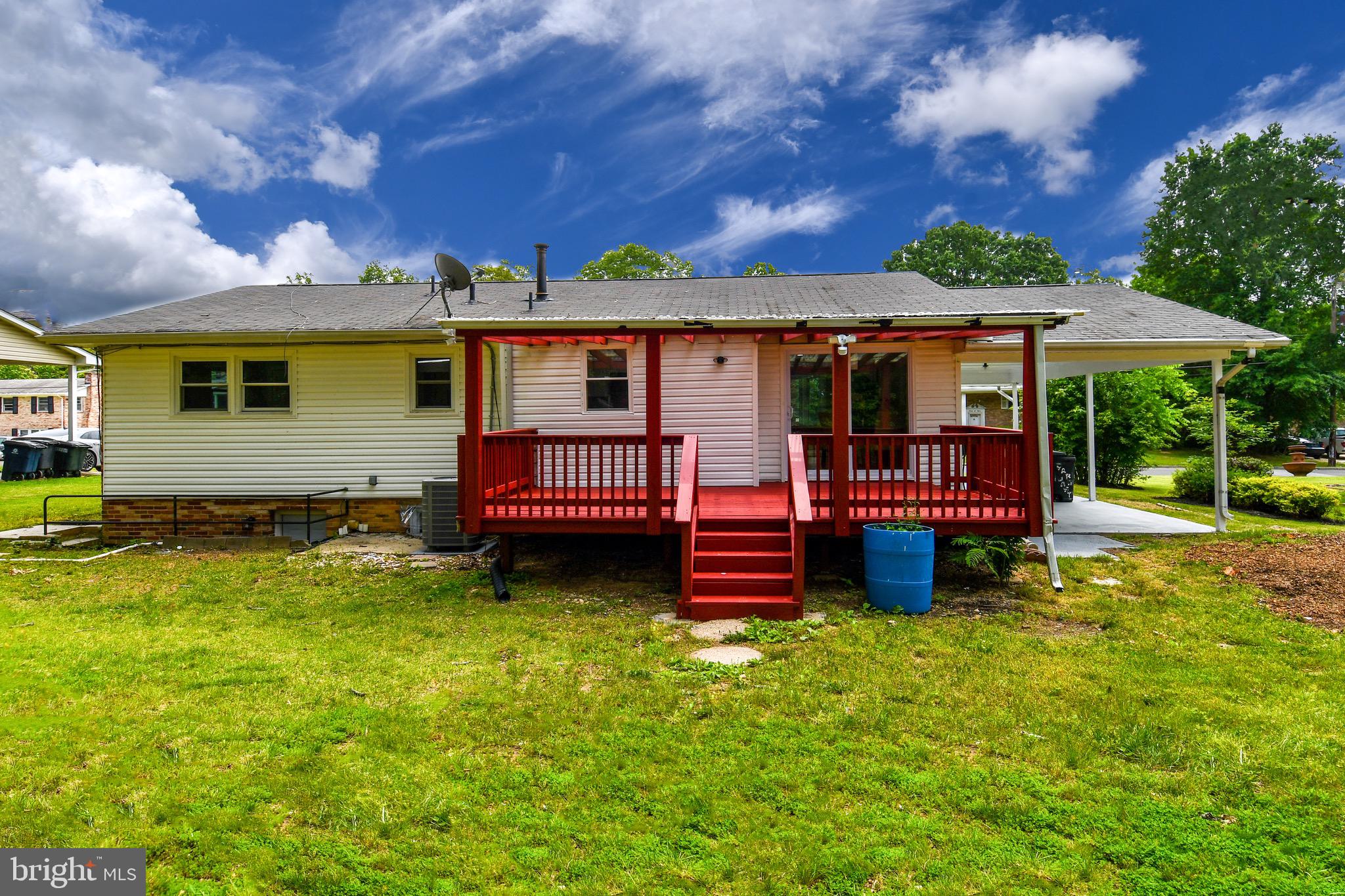 9616 Small Drive Clinton, MD 20735 - Photo 21 of 50 a view of a house with a yard porch and sitting area