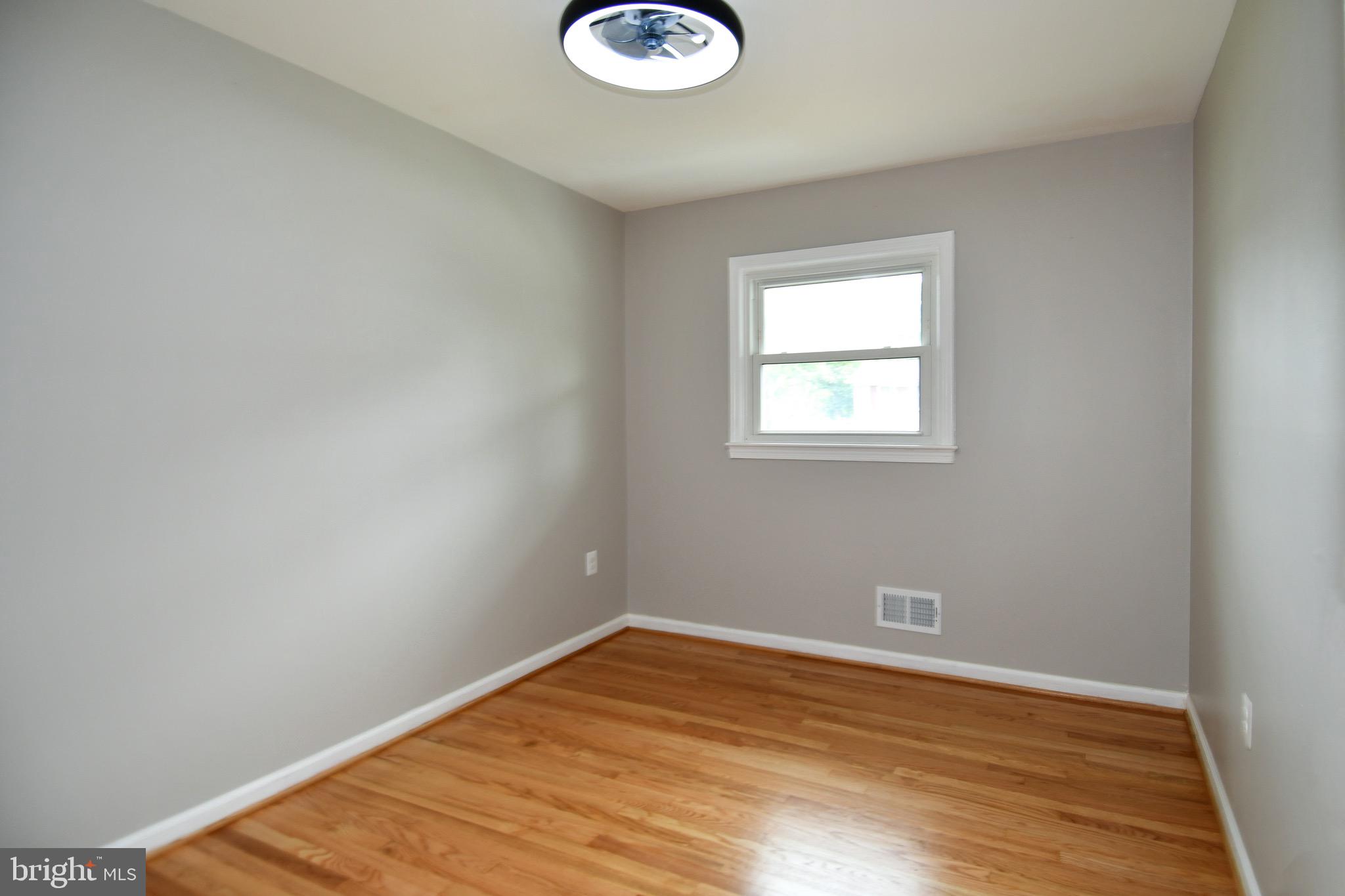 9616 Small Drive Clinton, MD 20735 - Photo 24 of 50 a view of empty room with wooden floor