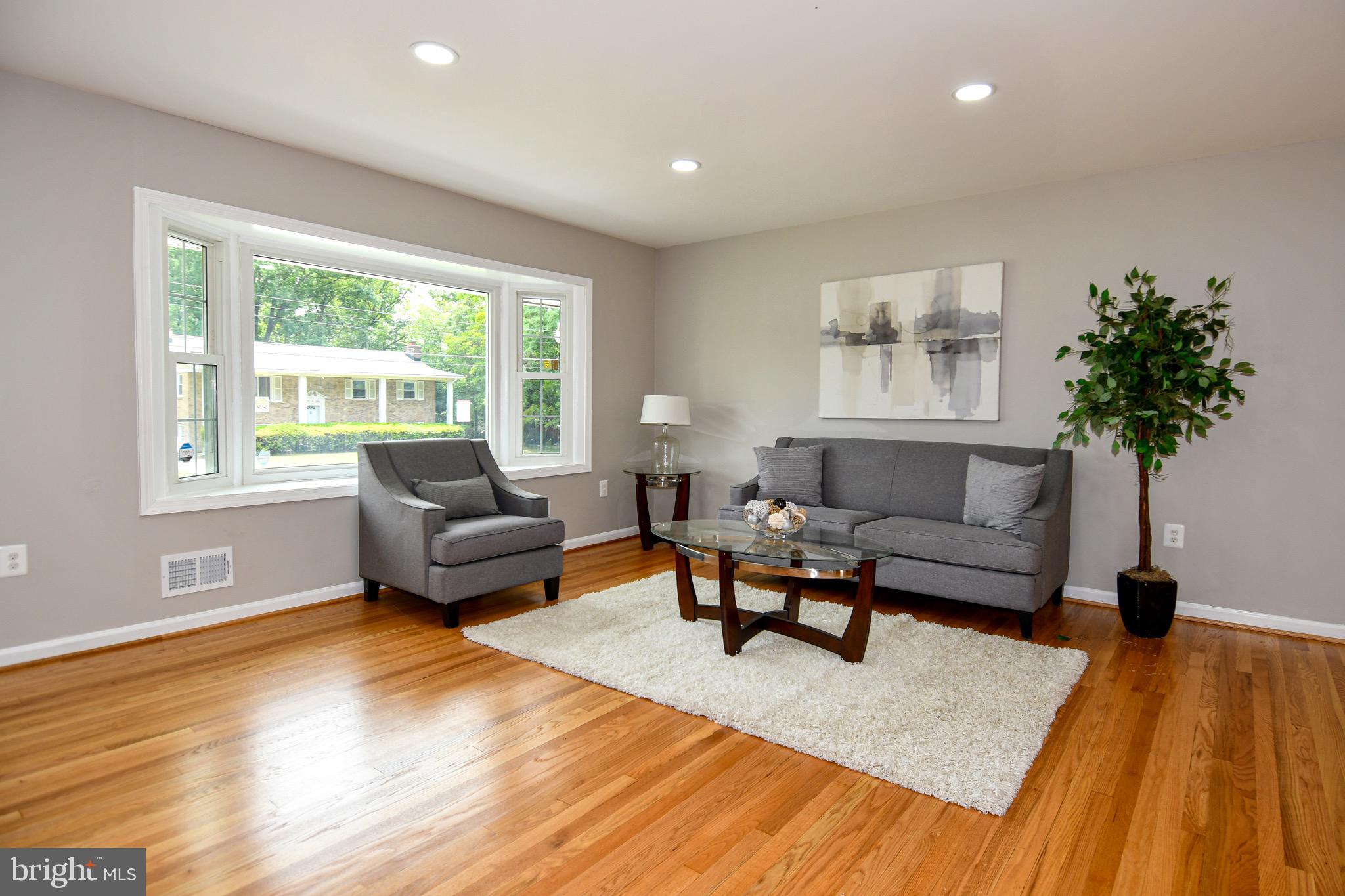 9616 Small Drive Clinton, MD 20735 - Photo 3 of 50 a living room with furniture and a large window